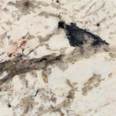 the marble is white and brown with black spots