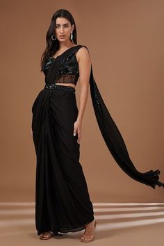 Black pre-draped saree with sequin embroidered border. Comes with sequin embroidered panelled blouse and belt. - Aza Fashions Black Georgette Draped Saree, Black Draped Georgette Saree, Evening Draped Blouse Piece With Mirror Work, Black Draped Saree With Sheer Dupatta, Black Bollywood Style Pre-draped Saree, Black Bollywood Pre-draped Saree, Evening Dupatta With Mirror Work And Draped Style, Evening Draped Dupatta With Mirror Work, Fitted Pre-draped Saree With Sequins