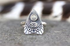 This listing is for one bold and mesmerizing sterling silver celestial planchette ring that is elegant and edgy and unique! The planchette is beautifully detailed with moon phases, an All Seeing Eye, and radiant lines. These sturdy and solid statement rings make a great gift for any witchy woman (or man!) - Choose your ring size at checkout! - Planchette measures 19mm by 15mm.- Ring band is made from sturdy 9 gauge half round sterling silver wire.- Made to Order. Please check current processing Celestial Metal Ring Jewelry, Celestial Style Metal Ring Jewelry, Mystical Silver Rings With Moon Phase, Sterling Silver Celestial Jewelry For Festivals, Silver Mystical Moon Phase Ring, Celestial Sterling Silver Jewelry For Festival, Celestial Style Sterling Silver Jewelry For Festivals, Mystical Silver Moon Phase Ring, Silver Celestial Jewelry For Festivals