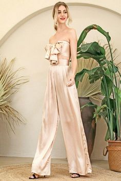 Silky Strapless Tie Front High Waisted Wide Leg Nude Two Piece Pants Set Make a bold statement! Perfect for a night out on the town in this two-piece pant set offers super chick style, Featuring wide-leg pants and a bandeau crop top. A strapless tie front bandeau crop top bow knots in the center, that lets you show plenty of skin and a pair of matching high waist palazzo pants with wide legs that create a gorgeous silhouette. Pair it with strappy heels for a great head-to-toe look! High waist pa Elegant Two-piece Summer Pants Set, Elegant Summer Two-piece Pants Set, Chic Summer Evening Sets, Chic Evening Sets For Summer, Chic Matching Set With Wide-leg Pants, Chic Two-piece Set, Elegant Summer Date Night Sets, Elegant Two-piece Pant Set For Summer, Elegant Two-piece Summer Bottoms Set