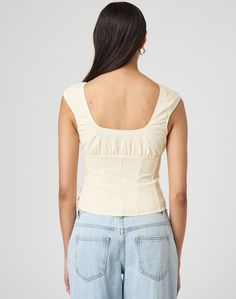 This delicate little number features cap sleeves, a ruched bodice and panelling. Fitted Ruched Top With Square Neck, Chic Fitted Cap Sleeve Tops, Chic Fitted Tops With Cap Sleeve, Spring Square Neck Ruched Top, Chic Tops With Fitted Bodice For Spring, Chic Fitted Bodice Tops For Spring, Chic Spring Tops With Fitted Bodice, Casual Fitted Top With Gathered Neckline, Casual Fitted Tops With Gathered Neckline