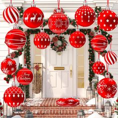 christmas decorations on the front door of a house