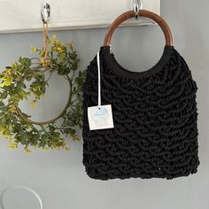 Beautiful Thick Knit Design Handbag With Stunning Wood Design Handles Handcrafted From India Black Woven Satchel Shoulder Bag, Black Woven Bucket Bag With Double Handle, Black Woven Hobo Bag With Top Handle, Black Woven Top Handle Hobo Bag, Everyday Bucket Bag With Bamboo Handle, Black Woven Satchel For Travel, Elegant Black Shoulder Bag With Bamboo Handle, Black Woven Satchel Straw Bag, Black Woven Straw Satchel Bag