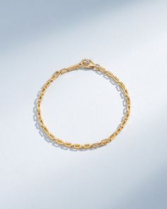 Crafted with 18-karat gold, this block-chain bracelets presents a symphony of four-sided hallow links. Each hollow block interlocks to form a chain that is both lightweight and striking in its thickness. Clean lines make this necklace is a versatile statement piece to wear all day or night. Details 18k yellow gold, rose gold or white gold 7" bracelet inch is adjustable at 6.5" inches 8" inch bracelet is adjustable at 7.5" inches 2.2mm link thickness Ref: GCB132 Luxury Tarnish-resistant Bracelets With Rectangular Links, Gold Bracelet With Rectangular Links For Everyday Luxury, Fine Jewelry Bracelets With Tarnish Resistant Rectangular Links, Yellow Gold-plated Sterling Silver Bracelet As Gift, Timeless Gold-plated Bracelet With Rectangular Links, Luxury Everyday Gold Bracelet With Box Chain, Luxury Everyday Gold Box Chain Bracelet, Minimalist Gold-plated Bracelet With Box Chain, Minimalist Gold Link Bracelet For Everyday