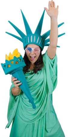 a woman dressed as the statue of liberty holding a bouquet of flowers