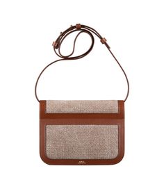 - Handbag with 80s-style jewel clasp. - Supple cowhide leather. - Adjustable leather strap to wear the bag on the shoulder or across the chest. - Magnetic goldtone hardware clasp. - Flap lined with cowhide suede split leather. - Two compartments and an interior pocket. - Embossed goldtone 'A.P.C.' logo on the clasp. - Also available in a bigger version: the Astra bag. Luxury Brown Flap Bag With Leather Trim, Elegant Brown Flap Bag With Leather Trim, Chic Brown Satchel With Brass Hardware, Elegant Rectangular Flap Bag With Leather Trim, Luxury Cognac Shoulder Bag With Leather Trim, Formal Flap Shoulder Bag With Leather Trim, Evening Satchel Shoulder Bag With Leather Trim, Luxury Flap Bag With Leather Trim For Everyday Use, Luxury Leather Trim Flap Bag For Everyday Use