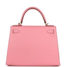 This Kelly, in the Sellier style, is in Rose Confetti epsom leather with gold hardware and has tonal stitching, two front straps with toggle closure, clochette with lock and two keys, single rolled handle and removable shoulder strap.The interior is lined with Rose Confetti chevre leather and has one zip pocket with an Hermes engraved pull and two open pocket on the opposite side.Collection: XOrigin: FranceCondition: Pre-owned; Excellent to Mint - This bag retains it shape. There's partial plastic on the hardware but missing from the turnlock and feet. There's moderate scratches to the turnlock and feet hardware. The exterior leather is clean with no signs of wear except towards the top handle. There's some minor signs of wear near the D-rings for the shoulder strap.Accompanied by: Hermes Hermes Kelly Retourne, Rose Confetti, Hermes Kelly Sellier, Kelly Retourne, Kelly Sellier, Hermes Box, Madison Avenue, Gold Hardware, Top Handle