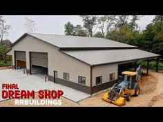 a large garage with a tractor parked in front of it and the words final dream shop rebuldings