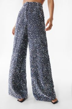 Bling in the boardroom. Feel glamorous in our sequin pants, made in high quality sequin fabric, with an extreme relaxed fit. Wear with the matching separates for a stellar occasion look, perfect for bachelorette nights, engagement parties, and all of your upcoming events, or pair with jeans to dress it down. Premium Two Piece Sequin Wide Leg Pants High Quality Sequin Fabric Head Turning Extreme Wide Leg Fit Comfortable High Waistline Button Front Fastening Matching Shorts and Blazer Sold Separately Model wears a size M (US size 6/UK size 10). Matching Separates, Going Out Trousers, Sequin Pants, Engagement Parties, Oasis Fashion, Matching Shorts, Sequin Fabric, Upcoming Events, Fashion Face