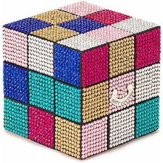 a rubik cube made out of multicolored beads is shown in this image