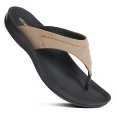 Step into everyday elegance with these cushioned flat sandals for women. Featuring a synthetic leather upper and stylish stitching, they boast a chic design that effortlessly enhances your ensemble. Enjoy lasting comfort with the cushioned strap and secure toe post, ensuring each step is cushioned and stable. Whether you're running errands or meeting friends for lunch, these sandals provide the perfect blend of style and comfort. Elevate your casual look effortlessly with their versatile appeal Comfortable Flat Sandals With Leather Footbed, Comfortable Leather Flat Flip Flops, Comfortable Flat Flip Flops With Arch Support, Leather Flat Sport Sandals With Arch Support, Comfortable Toe Post Sandals With Ortholite Insole, Comfortable Leather Footbed Flat Flip Flops, Flat Sandals For Women, Everyday Elegance, Meeting Friends