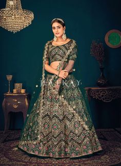 Green Mirrorwork Embroidered Wedding Lehenga Choli Meenakari Embroidered Fabric For Reception And Navratri, Anarkali Embroidered Fabric With Meenakari For Reception, Meenakari Embroidered Anarkali Fabric For Reception, Anarkali Lehenga With Multicolor Embroidery And Meenakari, Anarkali Lehenga With Meenakari Embroidery, Kundan Lehenga With Multicolor Embroidery And Zari Work, Designer Meenakari Chanderi Lehenga, Festive Semi-stitched Lehenga With Multicolor Embroidery, Multicolor Embroidered Lehenga With Mirror Work In Chinon