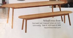 an advertisement for a wooden table and bench