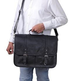 NEW Levinson Leather Goods Summer 2024 Featured Collection Introducing our Landon Black Leather Messenger Bag! Handcrafted with premium cowhide leather and accented with sleek silver hardware, this messenger bag exudes sophistication and durability. With its timeless design and quality materials, this bag is the perfect combination of style and functionality. Upgrade your daily carry with the Landon Messenger Bag! Features: Adjustable shoulder strap Leather top handle Tuck lock front closures Interior laptop sleeve for 17" laptop Three interior pen slots Four interior card slots Interior phone holder Interior key holder Canvas lined interior Material: High-quality cowhide leather Silver metal hardware Dimensions: 16"L x 4"W x 11"H Black Leather Messenger Bag, Daily Carry, Leather Duffel Bag, Leather Duffel, Buffalo Leather, Leather Bag Women, Leather Messenger Bag, Leather Briefcase, Leather Messenger