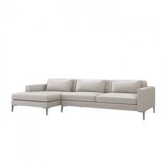 a gray couch sitting on top of a white floor