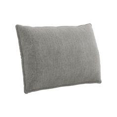 a gray pillow on a white background