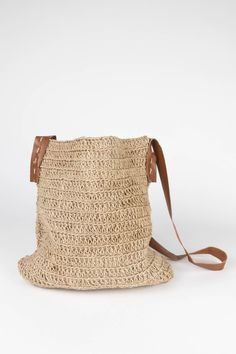 Bring organic style to every outfit with the Crochet Jute Shoulder Bag. A beautiful leather strap hangs at just the right length. Throw in your phone, keys, and wallet, and head out. Ethically handcrafted in small batches by environmentalist artisans with Prokritee, an organization in Bangladesh that provides jobs and skills training for women in under-resourced communities. Prokritee improves women's standard of living with safe jobs, fair wages, and the goal of self-reliance, helping mothers s Keys And Wallet, Crochet Jute, Organic Style, Skill Training, Small Batches, Leather Shoulder Bag, Leather Bag, Leather Straps, Shoulder Bag