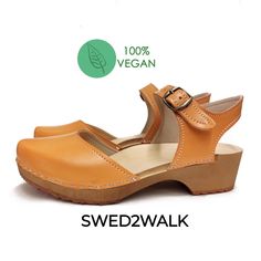 Vegan Swedish Clogs Sandals Orange Closed Toe Clogs With Rubber Sole, Orange Closed Toe Leather Clogs, Orange Leather Round Toe Clogs, Orange Leather Closed Toe Clogs, Orange Leather Clogs, Brown Clogs With Wooden Flat Heel, Brown Clogs With Cork-bed Midsoles And Flat Heel, Vegan Clogs, Alder Tree