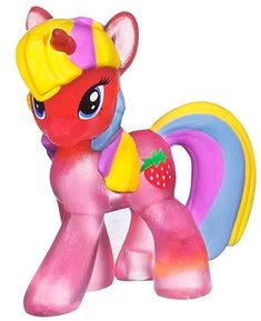 a pink pony with a yellow crown on it's head and a strawberry on its tail