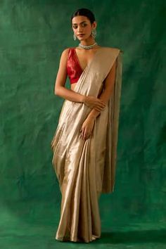 Beige and gold saree in pure zari handwoven fabric. Paired with a red chanderi handloom blouse. - Aza Fashions Symbol Of Grace, Tunic Designs, Silk Kaftan, Designer Jumpsuits, Blouse Models, Handwoven Fabric, Sari Fabric, Sharara Set, Blouse For Women