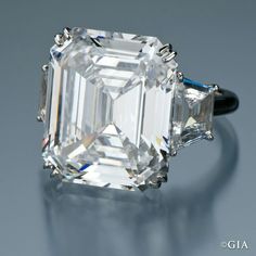 an emerald - cut diamond ring