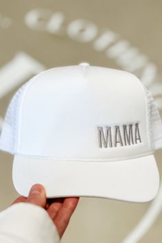 Women's Mama Embroidered Trucker Hat MAMA TRUCKER HAT Introducing the Mama Trucker Hat - the ultimate summer accessory for cool moms on the go! With its playful design and lightweight material, this hat is perfect for keeping the sun out of your face while looking effortlessly stylish. Don't let the summer heat bring you down, grab a Mama Trucker Hat today! Take a look at our other hats and accessories HERE! Details One size Women's Mama Embroidered Trucker Hat 3 Color options: Black, White and Mama Hat, Hair Gift, Mom Hats, Suns Out, Future Family, Fuchsia Color, Scarf Jewelry, Summer Heat, Summer Accessories