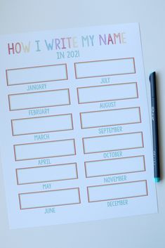 a printable how i write my name calendar next to a pen