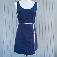 Nwt Navy Blue Cotton Dress With White Piping Trim Sleeveless With Scoop Neck Empire Waist With 8 Buttons Down Side Of Skirt That Open As High As You Dare Hidden Back Zip Smocked Back For Excellent Fit Pit To Pit 18” Waist 32” Hips 40” Length 32” Navy Fitted Cotton Mini Dress, Navy Stretch Mini Dress For Summer, Casual Navy Sleeveless Mini Dress, Navy Casual Lined Dress, Casual Navy Lined Dress, Blue Cotton Dress, Red Accessories, Cotton Dress, Empire Waist