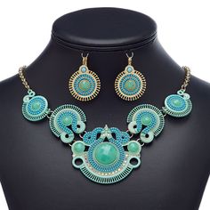 Ready-to-wear jewelry is great for counter sales or giving as a gift. Gold-finished brass, steel and "pewter" (zinc-based alloy) necklace and earring set features turquoise blue embellishments and glass rhinestone accents. Necklace And Earring Set, Gold Enamel, Bead Embroidery, Everyday Jewelry, Ear Wire, Beaded Embroidery, Turquoise Blue, Lobster Claw, Gift Necklace