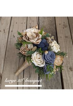 a bridal bouquet with blue and white flowers on a wooden surface, text says large 10 bouquet