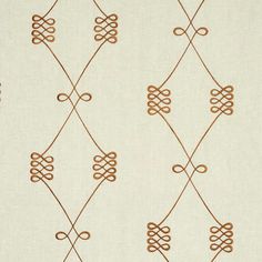 a beige and brown wallpaper with an intricate design on it's back side