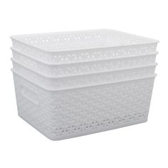 three white plastic baskets stacked on top of each other