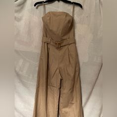 Nwt Monteau Los Angeles Strapless Linen Blend Belted Jumpsuit W/Smocked Back Color Tan / Beige Size M Features Strapless Tube Jumpsuit Tube Top Smocked One Piece Smocked Back Belted Jumpsuit Pleats At Waistline Functional Hidden Seam Side Pockets Pull On Style Fabric & Care 83% Rayon / 17% Linen Hand Wash Line Dry Never Worn! Too Big For Me And Return Window Missed! Strapless Fitted Jumpsuits And Rompers, Chic Beige Strapless Jumpsuit For Summer, Spring Strapless Jumpsuit For Work, Fitted Strapless Jumpsuits And Rompers For Day Out, Beige Strapless Jumpsuit For Summer, Fitted Strapless Jumpsuit For Day Out, Beige Jumpsuit For Night Out, Strapless Jumpsuit For Date Night In Spring, Spring Date Night Strapless Jumpsuit