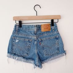 These vintage Levi's shorts are in good condition, perfect for everyday wear this summer. *Brand: Levi's, 550 *Original Tag Size: Husky 28W Measurements: Waist: 27 inches, Hips: 35 inches, Rise: 8 inches, Inseam: 2.25 Inches. Material: 100% Cotton Vintage Mid-rise Bottoms With Built-in Shorts, Vintage Relaxed Fit Jean Shorts With Pockets, Vintage Relaxed Fit Shorts With Pockets, Vintage Mid-rise Shorts With Pockets, 90s Style Shorts With Belt Loops, Retro Cutoff Bottoms For Summer, Vintage Jean Shorts With Belt Loops For Summer, 90s Style Bottoms With Built-in Shorts, 90s Style Bottoms With Belt Loops For Summer