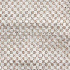 an upholstered white and brown textured fabric