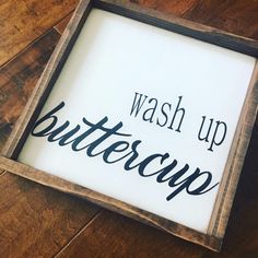 a framed sign that says wash up buttercup