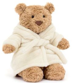 a teddy bear wrapped in a towel