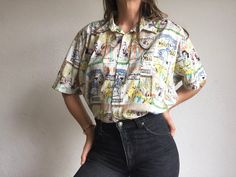 "Vintage shirt with funny print Made in France 1980s White shirt with multicolor vintage publicity pattern. Wide straight cut . Shirt collar Short sleeves. One chest pocket left side. Rounded bottom. 6 buttons front . In perfect condition . Material: 100% Coton Size : 42 Our woman model wears usually size S (36/38) and measures 170cm/66.9\". Our man model wears usually size M (40/42) and measures 175cm/ 68.8\" Measurements (flat): Length: 74cm - 29.1\" Shoulder: 51cm - 20\" Chest: 65cm - 25.5\" Vintage Print Blouse, Cut Shirt, Man Model, Novelty Print, Vintage Shirt, Patterned Shorts, Shirt Collar, Print Shirt, Straight Cut