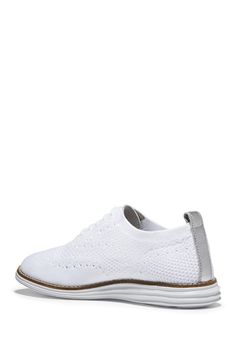 A pair of comfy, knit upper sneakers matches with anything in your closet for a sporty chic look. Sizing: True to size. B=standard width. Round toe. Wingtip and brogue detail. Lace-up closure. Back pull-tab. Removable padded insole. White sole. Imported Casual Summer Wingtip Lace-up Shoes, Casual Summer Lace-up Wingtip Shoes, Casual Oxfords With Perforated Toe Box For Work, Casual Workwear Oxfords With Perforated Toe Box, White Wingtip Lace-up Casual Shoes, Casual Summer Wingtip Oxfords, Casual Wingtip Oxfords In Oxford Material, Casual Wingtip Oxford Lace-up Shoes, Casual Oxford Wingtip Lace-up Shoes