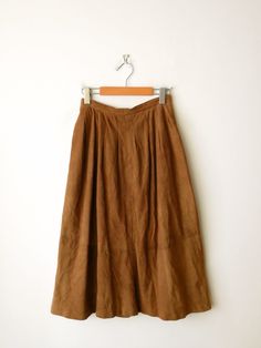 "Vintage Camel Brown Soft Suede A-line Midi Skirt from 70's. Measurements Length          : 30 1/2\" Waist             : 24\" Hips               : 44\" Condition     : Gently used. There's few stains as shown in the last three pics.  ※Please read the policy before you purchase※" Wishlist Manifestation, Thrift Wishlist, Ll Bean Jacket, Find Style, Clothes Closet, Soft Suede, Favorite Outfit, Camel, Midi Skirt