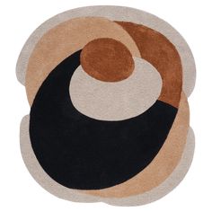 an abstract rug with black, brown and white circles on it's center piece