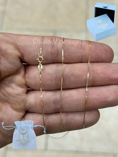 14K Solid Yellow Gold Box Necklace Chain 0.50mm Stamped: 14K Average Weights: *16"   .65 Grams *18"   .73 Grams *20"  .80 Grams *22"  .86 Grams *24"  .95 Grams *26"  1.03 Grams *28"  1.09 Grams *30" 1.17 Grams Lock: Ring Clasp Arrives in a Velvet Gift Pouch and includes FREE SHIPPING to the USA To see more chains and other handcrafted jewelry collections, please visit my storefront here : https://www.etsy.com/shop/OliviaVdesigns About OliviaVDesigns: Thanks for taking a look at Olivia V. Designs  Been doing jewelry all my life. This is my specialty :) I'm a jewelry designer working in my hometown Brooklyn, where I was born and raised. I have a cute workshop in my house where I create all my jewelry and designs. Always trying to create new ideas, infused with classic collection styles Pleas Gold Plated Chain Necklace Stamped 14k For Gift, Gold Plated 14k Stamped Chain Necklace Gift, Dainty Curb Chain Jewelry For Anniversary, 14k Yellow Gold Jewelry With Box Chain, Rose Gold Jewelry With Delicate Chain, Gift 14k Gold Hallmarked Chain Necklace, Gift 14k Stamped Yellow Gold Chain Necklace, 14k Gold Box Chain Necklace For Anniversary, Fine Jewelry 14k Gold Box Chain