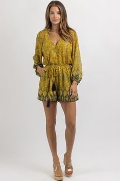 Bohemian Printed V-neck Jumpsuits And Rompers, Printed Long Sleeve Jumpsuit And Romper For Vacation, Printed Long Sleeve Jumpsuits And Rompers For Vacation, Long Sleeve Printed Jumpsuits And Rompers For Beach, Long Sleeve Printed Jumpsuits For Beach, Long Sleeve Printed Jumpsuits For The Beach, Bohemian Printed Jumpsuits And Rompers With V-neck, Bohemian V-neck Printed Jumpsuits And Rompers, Bohemian Printed V-neck Jumpsuit