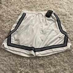 Nike Dry Women’s White/Black Stripe Basketball Shorts Size Medium Tall. New With Tags! White Nike Athletic Shorts For Summer, Nike White Streetwear Shorts, White Athletic Shorts For Streetwear In Spring, Nike Athletic Shorts, Nike Pro Shorts, Basketball Clothes, Running Shorts Women, Nike Running Shorts, Track Shorts