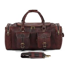 This handcrafted Vintage Dark Brown Traveller Duffle Bag is a timeless travel companion, made of genuine full-grain leather with an elegant and classic exterior. Its vintage design will make you stand out, so you can make a stylish statement wherever you go. An inspired homage to old school, this duffle bag is sure to turn heads. Salient Features Material: Full Grain Goat Leather Color: Vintage Brown High-quality canvas fabric has been finely stitched inside for a neat lining. Pure brass hardwar Vintage Leather Duffle Bag With Leather Trim, Classic Brown Weekender Bag For Trips, Classic Brown Shoulder Bag For Overnight Trips, Luxury Leather Backpack For Travel In Cognac, Luxury Cognac Leather Backpack For Travel, Luxury Leather Backpack With Leather Trim For Travel, Luxury Leather Backpack With Leather Trim, Luxury Cognac Leather Travel Backpack, Classic Brown Duffle Bag For Trip