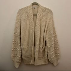 Madewell Knit Cardigan With Sleeve Detailing. New Without Tags! Casual One Size Knit Sweater Coat, Casual One-size Knit Sweater Coat, Beige Cotton Knit Cardigan, Beige Textured Knit Cotton Cardigan, Casual One-size Knit Cardigan, Cream Soft Knit Cardigan For Cold Weather, Casual Textured Knit Cardigan One Size, Cream Cotton Cardigan With Soft Knit, One Size Cream Knit Outerwear