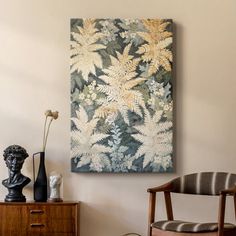 a room with two chairs and a painting on the wall above it that says fern