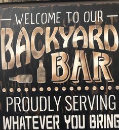 a sign that says, welcome to our backyard bar proudly serving whatever you bring