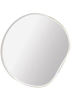 an oval shaped mirror with gold trim