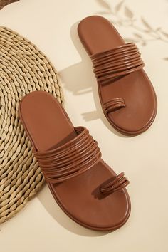 Step into comfort and style with our Faux Leather Toe-Ring Slide Sandals. These sandals feature a trendy toe-ring design and a sleek faux leather finish, ideal for sunny days and casual outings. Product code: CAB01B4F004JJ Features:  Round toe Toe ring Slip-on styling. Flat Faux Leather Beach Sandals, Beach Flat Faux Leather Sandals, Faux Leather Sandals For Summer Beach, Faux Leather Sandals For Beach And Summer, Faux Leather Sandals For Beach In Summer, Trendy Toe Loop Sandals With Synthetic Material, Trendy Toe Loop Synthetic Sandals, Adjustable Flat Faux Leather Sandals, Trendy Synthetic Toe Loop Sandals